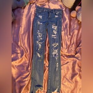 skinny ripped american eagle jeans